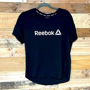 Reebok size large black with white lettering short sleeve shirt